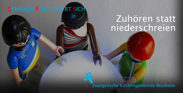 Banner mit Schriftzug "Zuhören statt niederschreien"